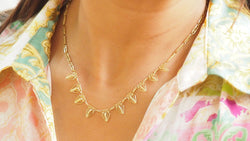 Collier draperie ancien en or jaune