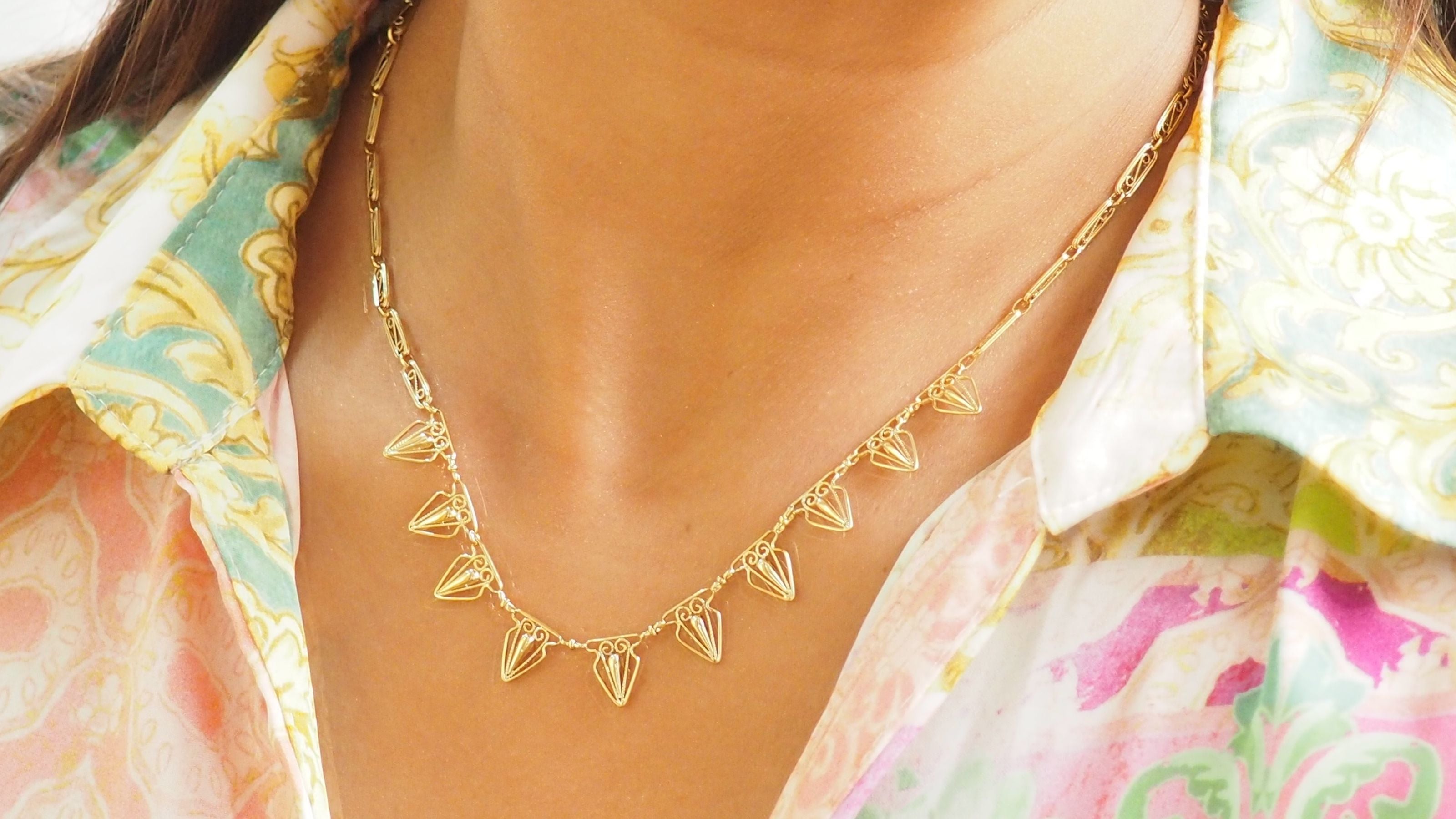 Collier draperie ancien en or jaune