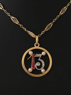 Pendant in yellow gold, paltinium, rubies, pearls and diamonds