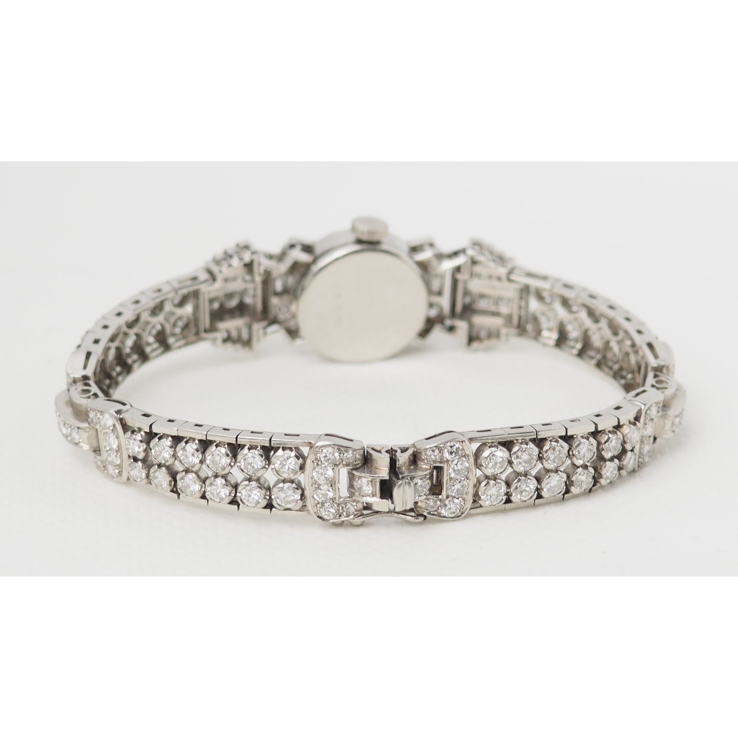 Montre ancienne en or platine et diamants