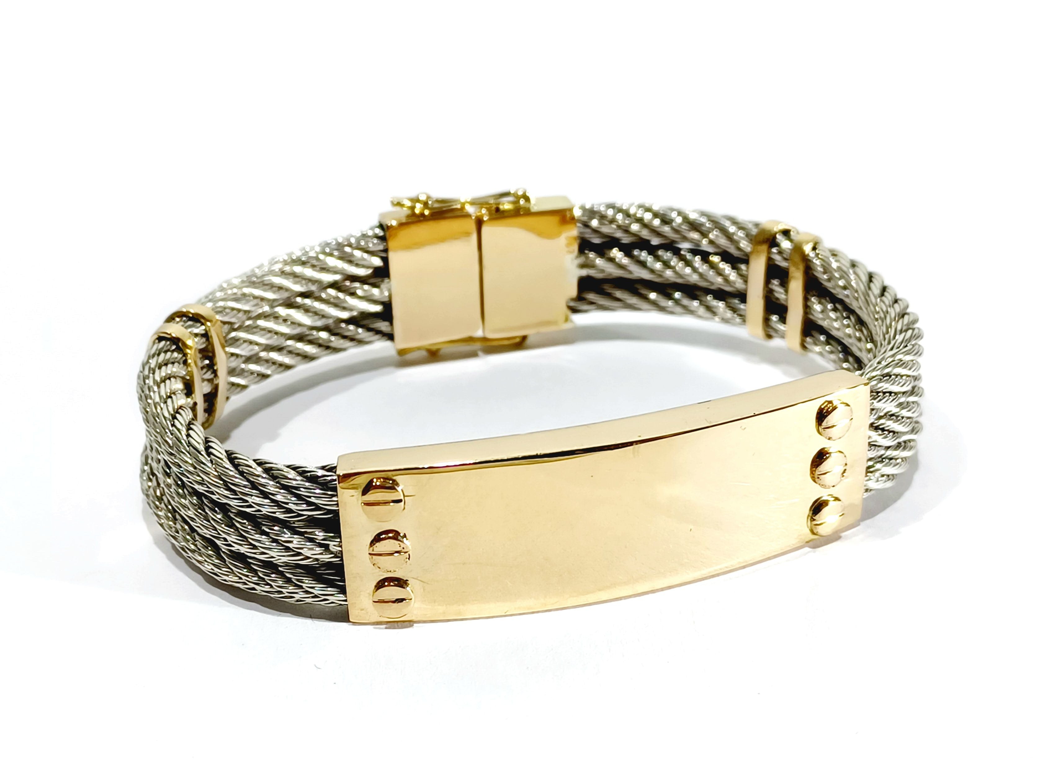 Bracelet at yellow gold and silver