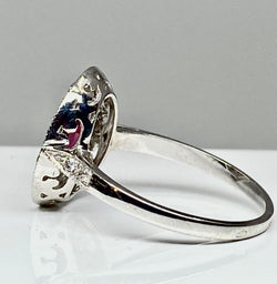 Bague marguerite en or 18 carats en rubis et diamants