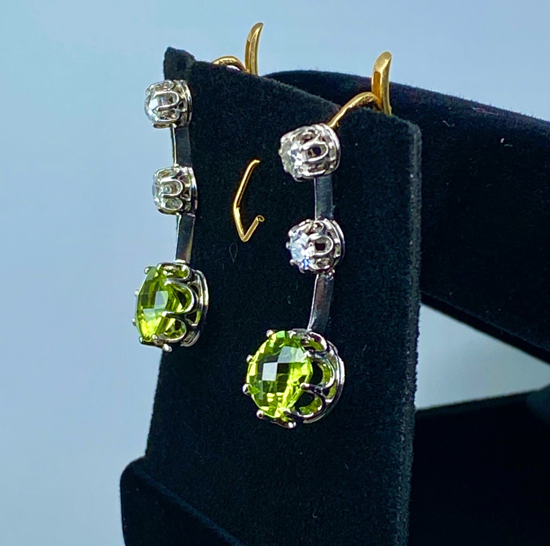 Gold earrings, paltinium, peridots and diamonds