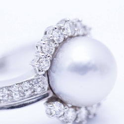 Bague en or avec perle naturelle et diamants d'occasion
