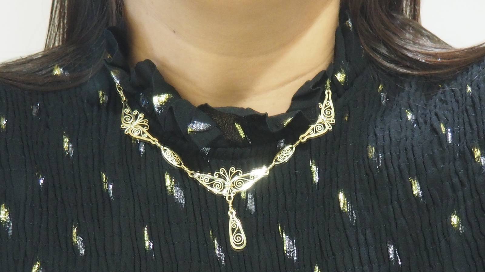 Collier draperie ancien en or jaune