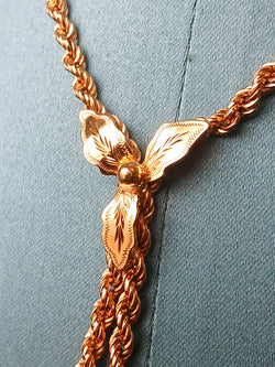 Sautoir ancien à motif floral en or jaune