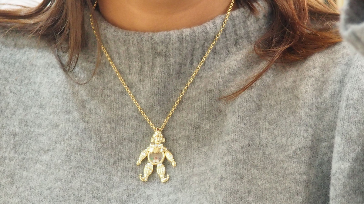 Chopard Happy Clown pendant in yellow gold and moving diamonds 