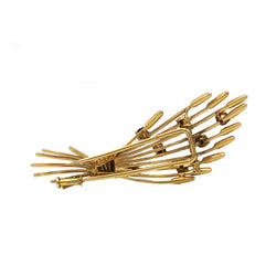 Broche Clip MELLERIO en or jaune, rubis et saphirs