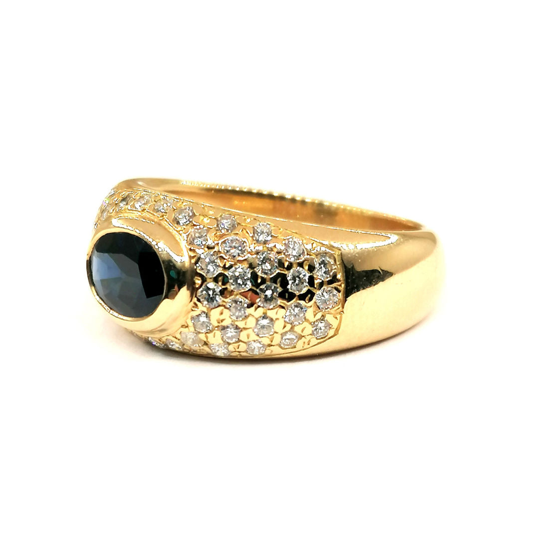 Yellow gold sapphire and diamond ring 