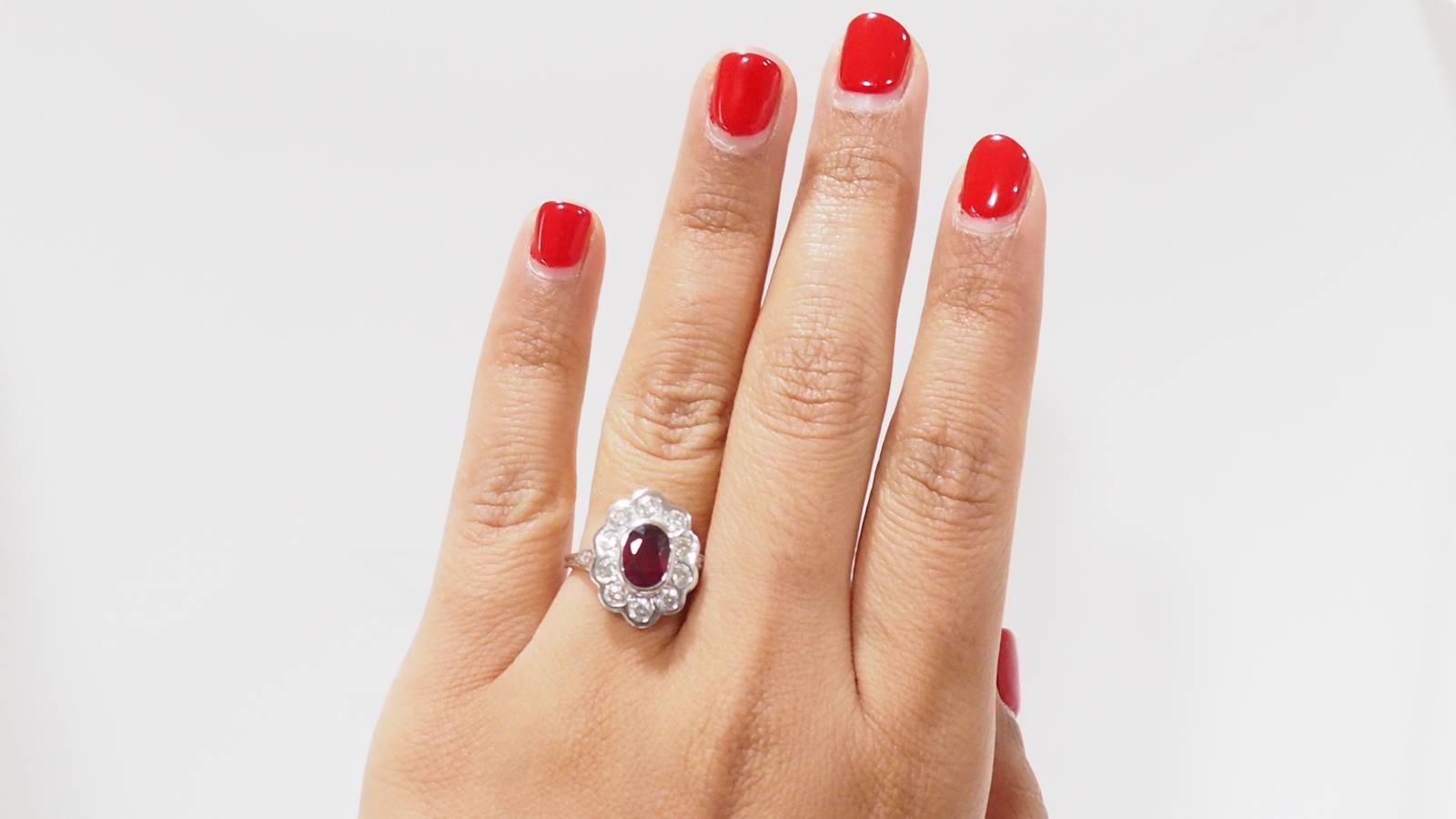 Entourage ring in white gold, rubies and diamonds 