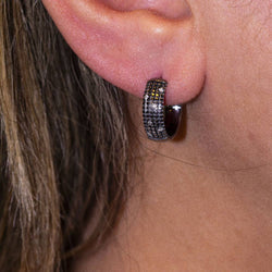 Boucles d'oreilles DAMIANI en or noir. D'occasion