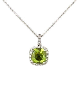 Collier, en or blanc 18k serti d’un très beau péridot