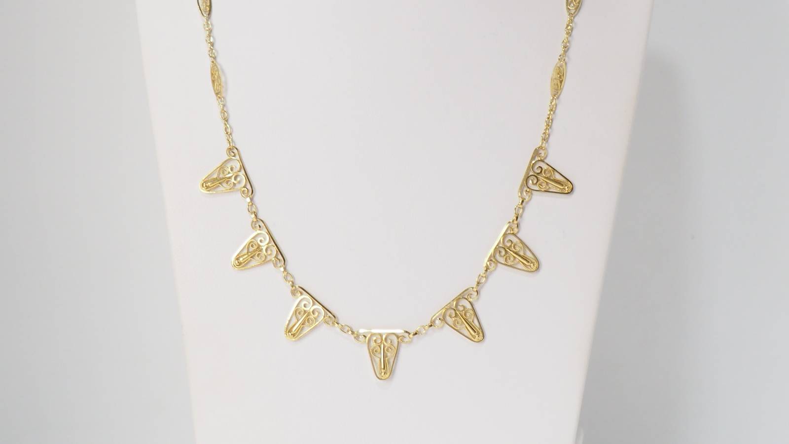 Collier draperie en or filigrané