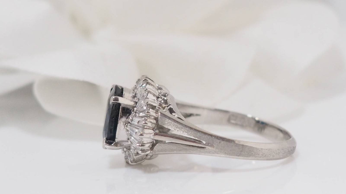 White gold, oval sapphire and diamond ring 