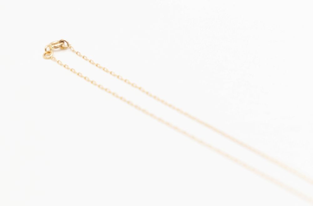 Collier maille forçat en or jaune et diamant