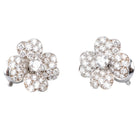 Boucles d'oreilles Cosmos de Van Cleef & Arpels en or et diamants