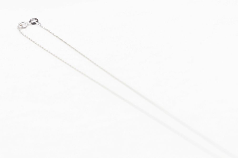 Collier maille forçat en or blanc et onyx