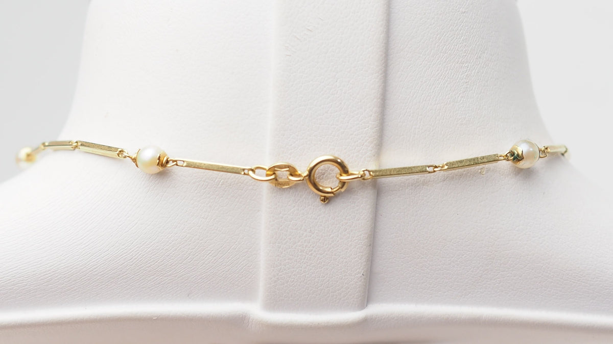 Yellow gold and cultured pearl necklace