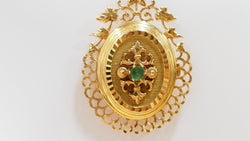 Pendentif porte photo en or jaune et émeraude