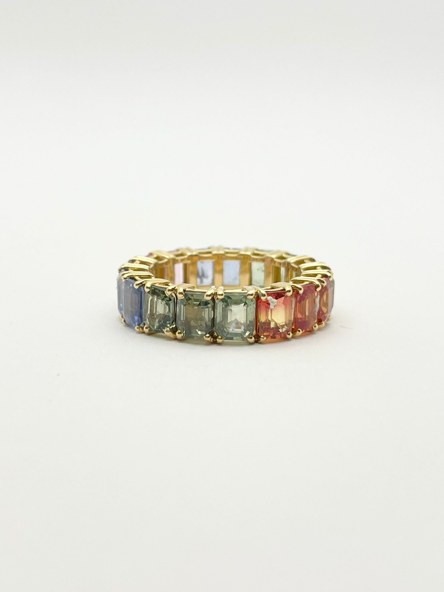 Bague null Eternè en or jaune et saphirs multicolor