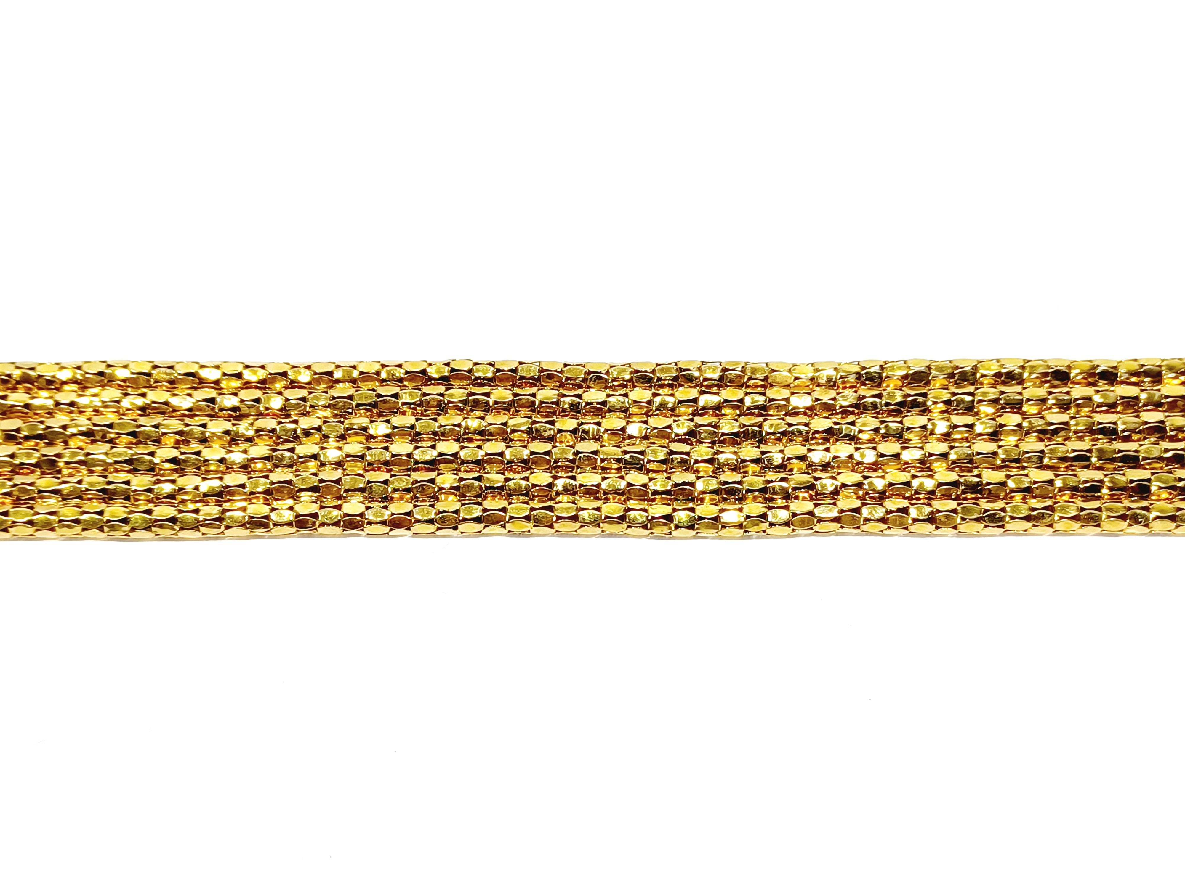 Bracelet Cuff in yellow gold and ruby