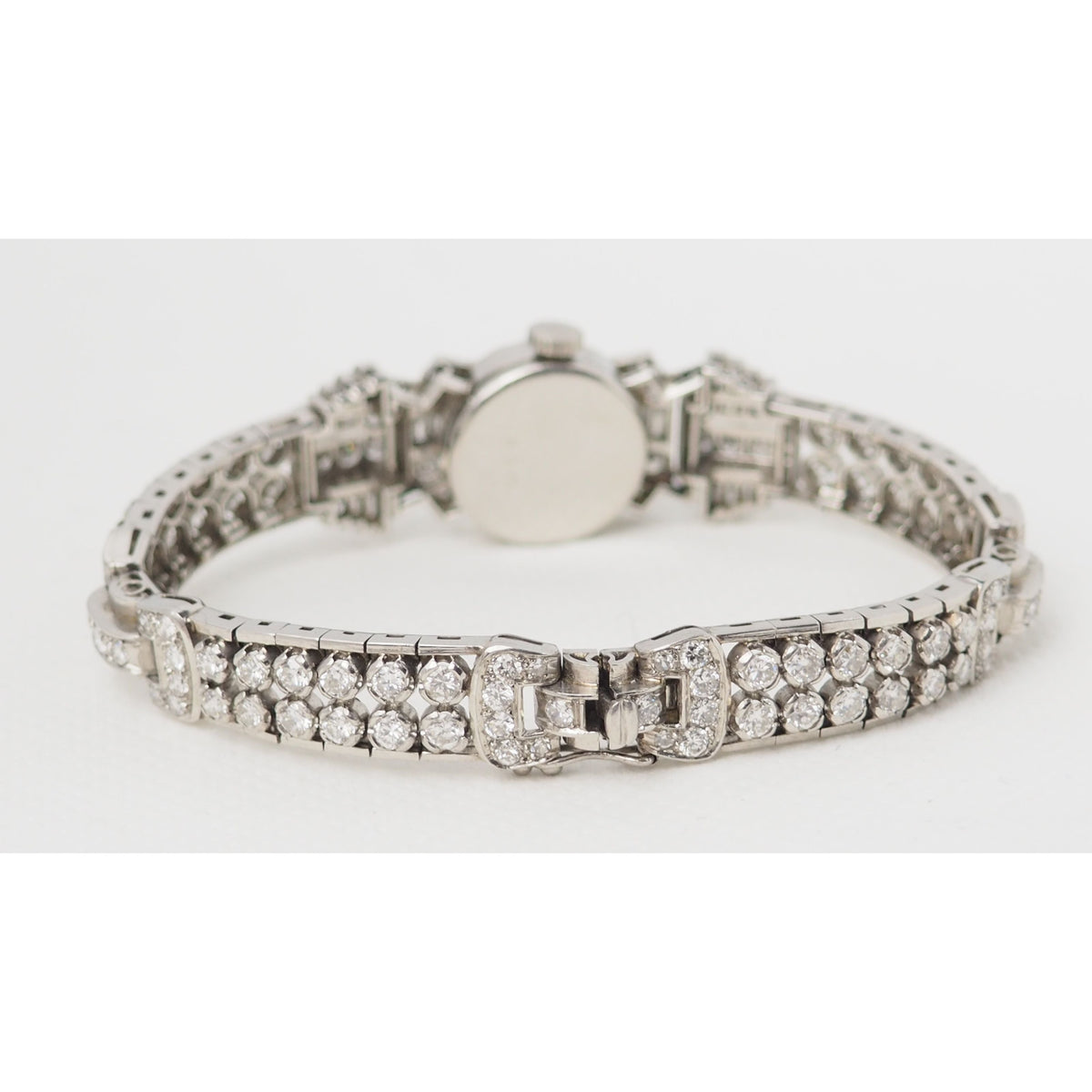 Antique watch in platinum gold and diamonds 