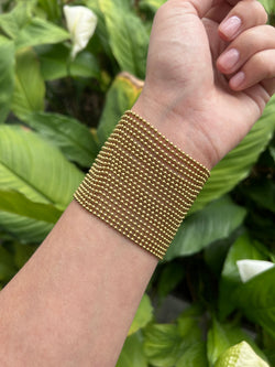 CARTIER Draperie large model cuff bracelet in yellow gold, with its certificate of origin