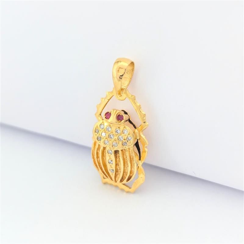 Pendentif animalier en or jaune diamants et rubis