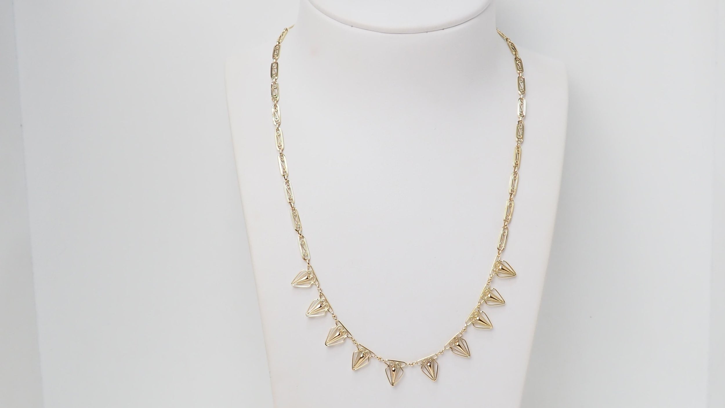 Collier draperie ancien en or jaune