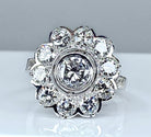 Bague marguerite en or blanc 18 carats sertie de diamants