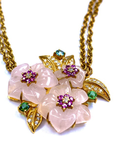 Collier en or 18 carats orné de 3 fleurs en quartz et feuilles en diamants