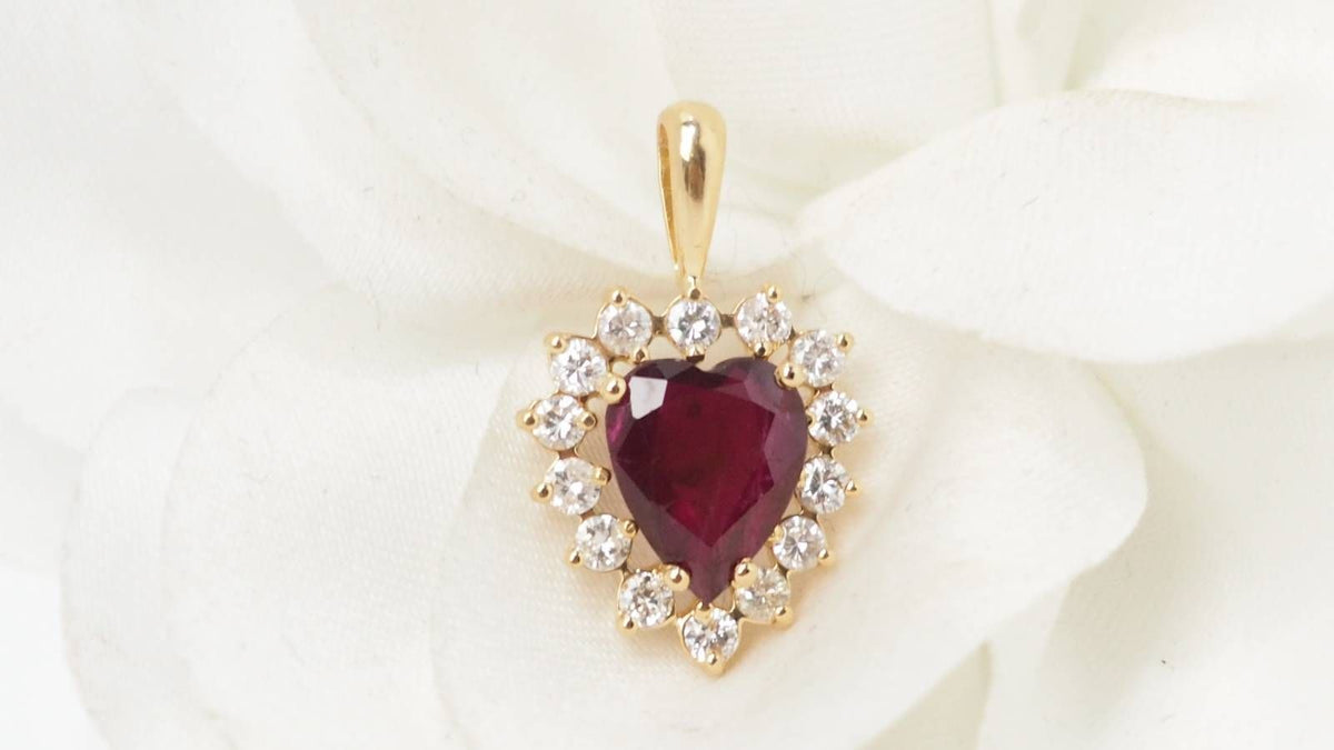 Heart pendant necklace in yellow gold, diamonds and rubies 