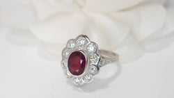 Entourage ring in white gold, rubies and diamonds 