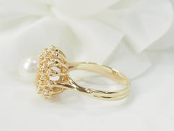 Ring daisy in yellow gold and cultured pearl