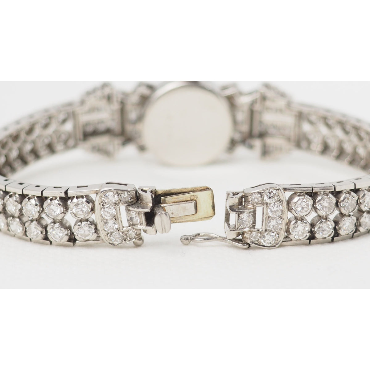 Antique watch in platinum gold and diamonds 