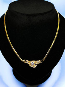 18-karat yellow gold necklace with diamond motif