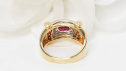 Two-tone gold ribbon ring with diamonds and rubies 