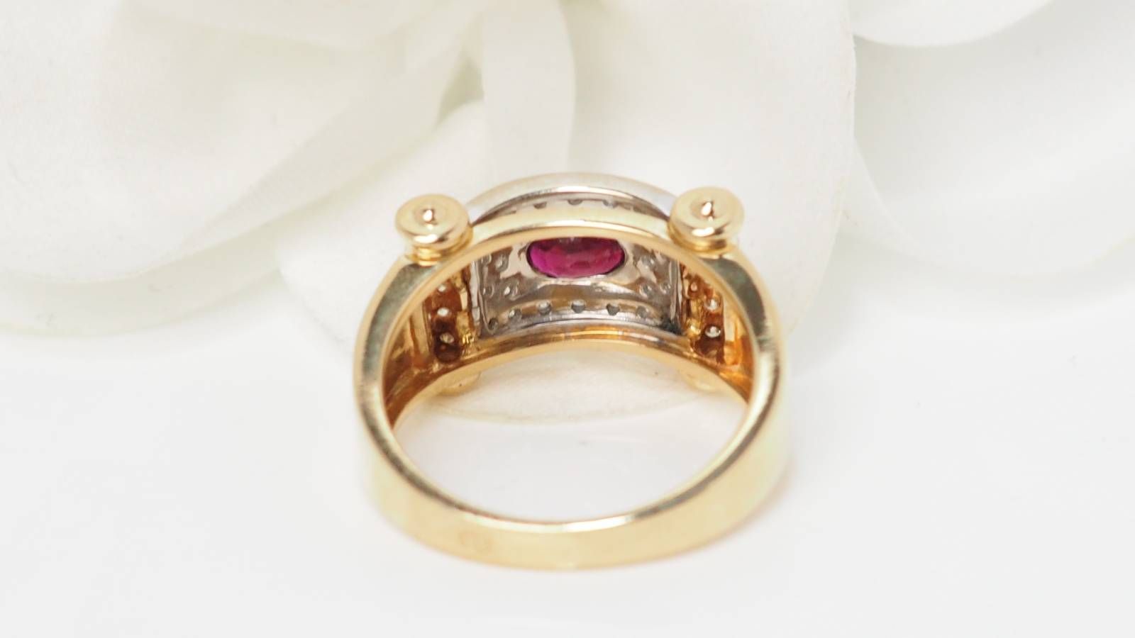 Two-tone gold ribbon ring with diamonds and rubies 