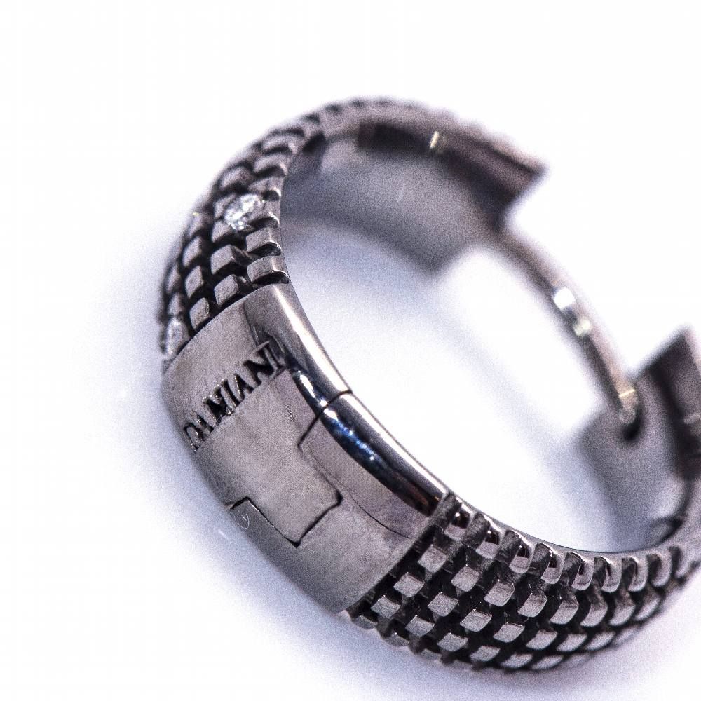 Boucles d'oreilles DAMIANI en or noir. D'occasion