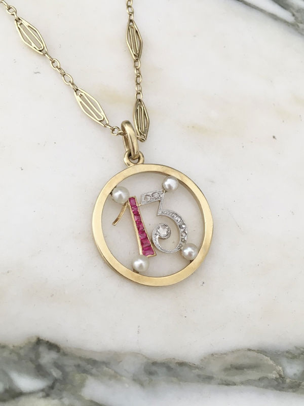Pendant in yellow gold, paltinium, rubies, pearls and diamonds