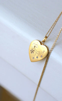 Médaillon cœur ouvrant en or, diamants, et perles - Castafiore