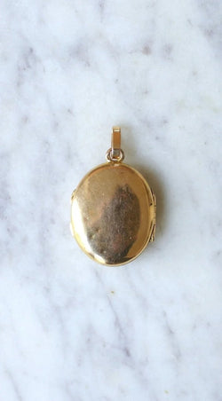 Médaillon ouvrant croix perles sur or - Castafiore