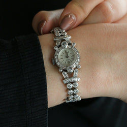 Montre Art Deco or blanc platine diamants - Castafiore