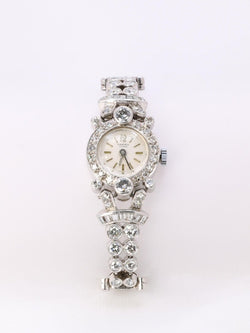 Montre Art Deco or blanc platine diamants - Castafiore