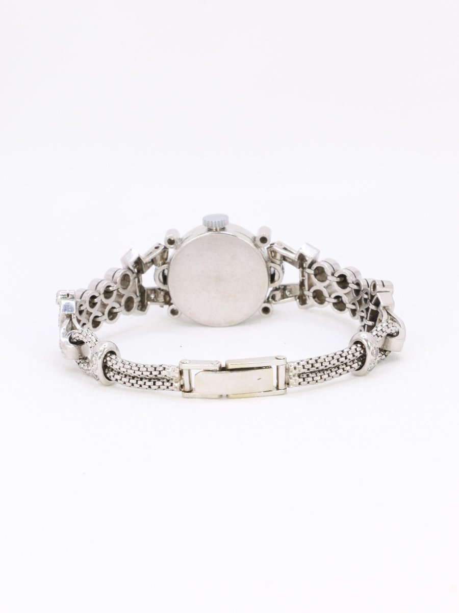 Montre Art Deco or blanc platine diamants - Castafiore