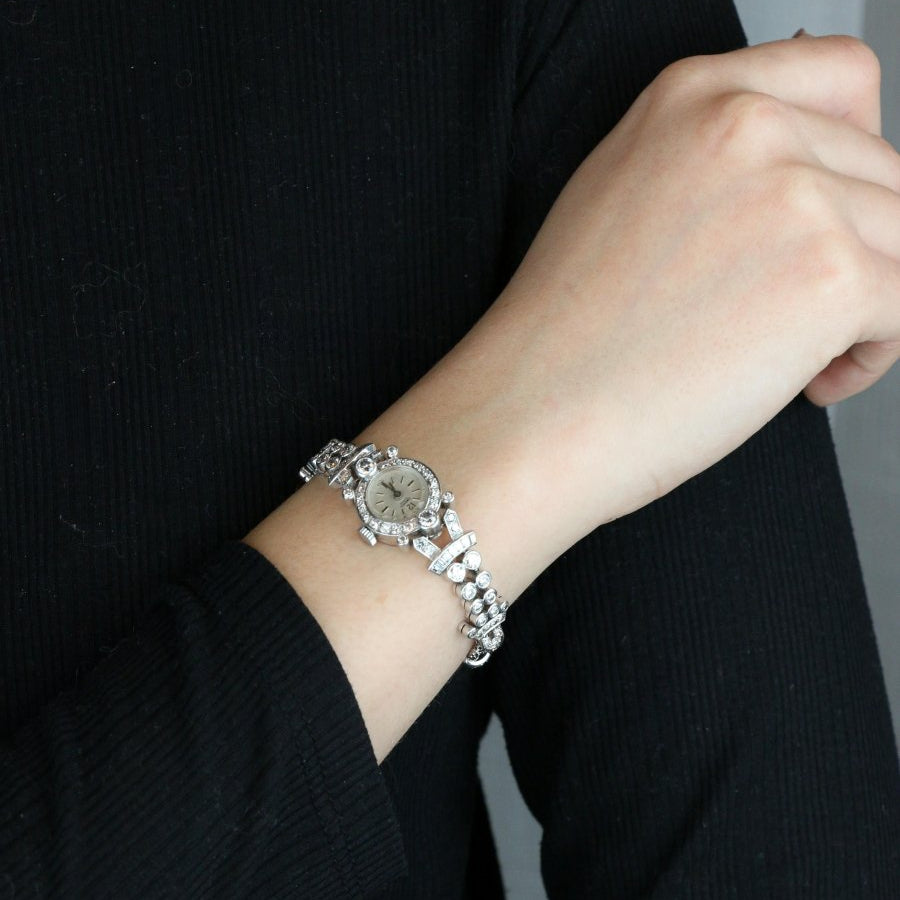 Montre Art Deco or blanc platine diamants - Castafiore