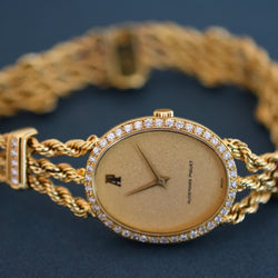 Montre AUDEMARS PIGUET "Classique" en or jaune et diamants - Castafiore