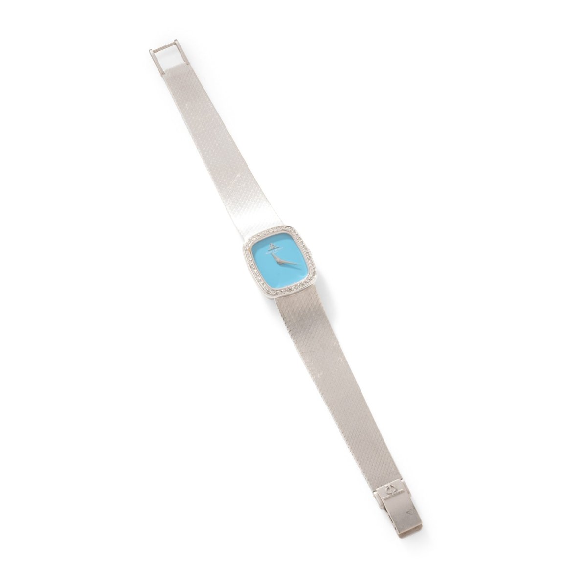 Montre BAUME ET MERCIER en or blanc, turquoise et diamants - Castafiore