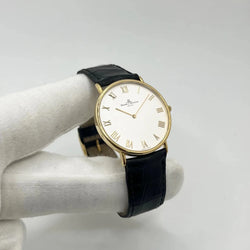 Montre BAUME & MERCIER "Classima" en or jaune, acier et cuir - Castafiore