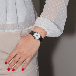 Montre BAUME & MERCIER en or blanc, saphir et cuir - Castafiore